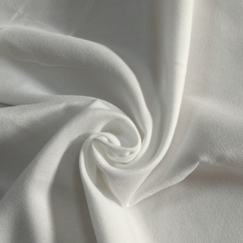Quidnam polyester persici pellis fabricae est et quomodo textura consequitur?